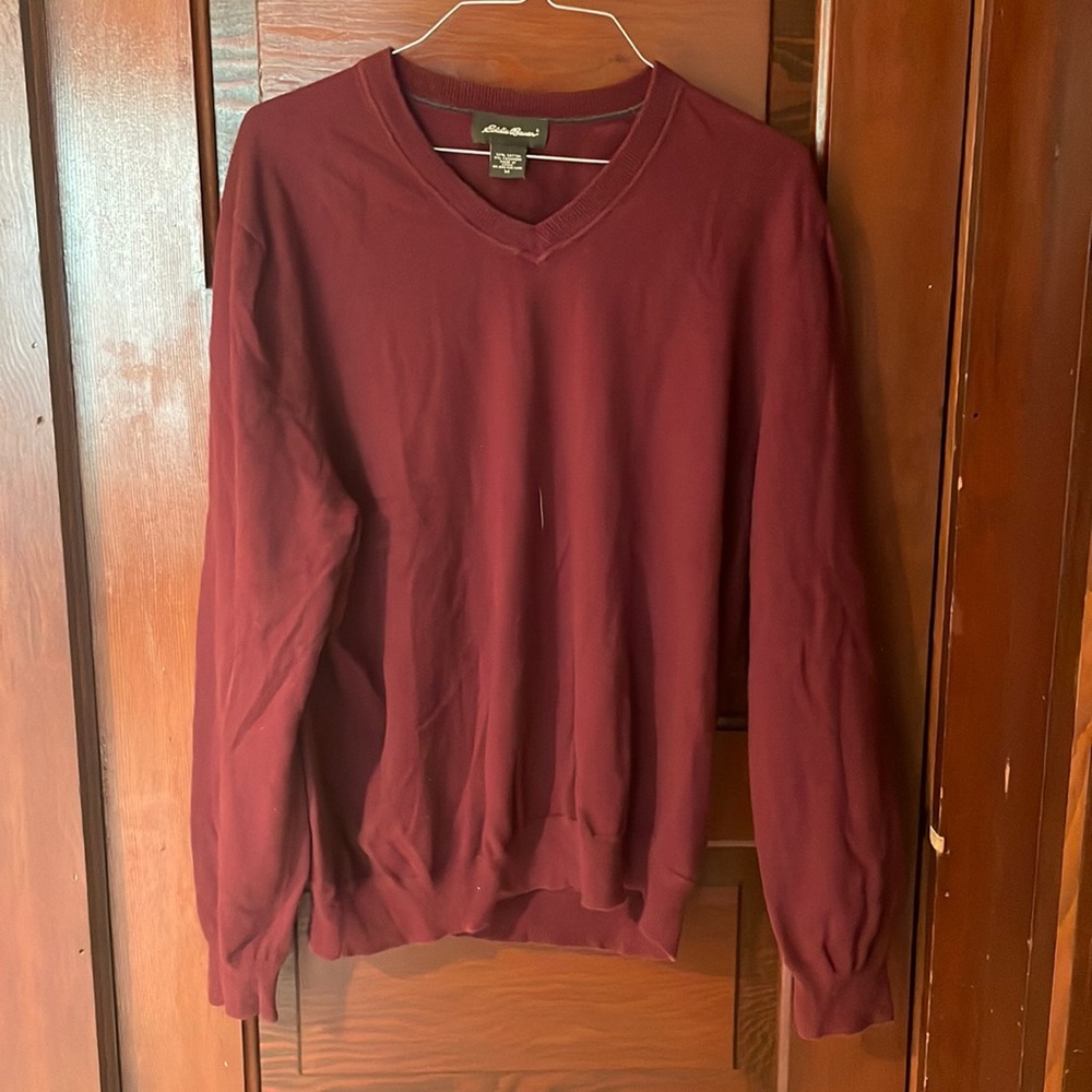 Red sweater. Size M